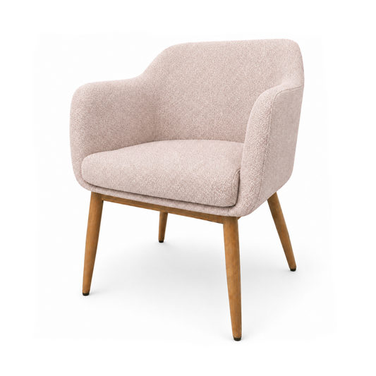 Pink armchair with wooden legs on a white background
